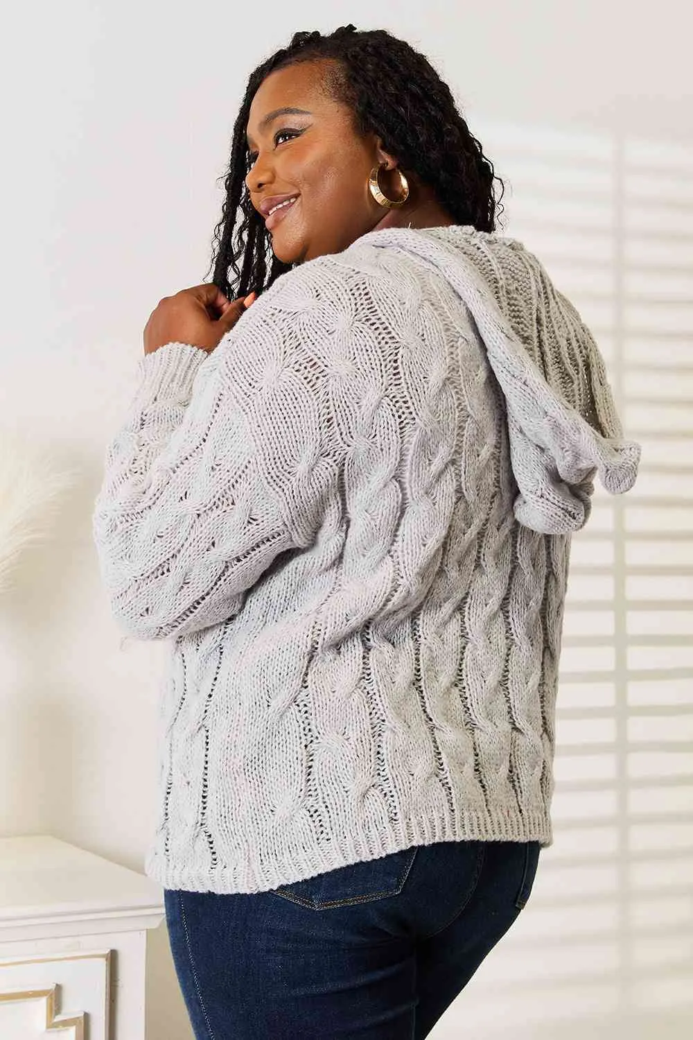 Cozy Up in Cable-Knit Hooded Sweater